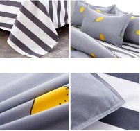 Постельный набор серого цвета с лимонами фото