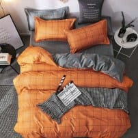 Постельный набор оранжевого цвета в стильную клетку фото